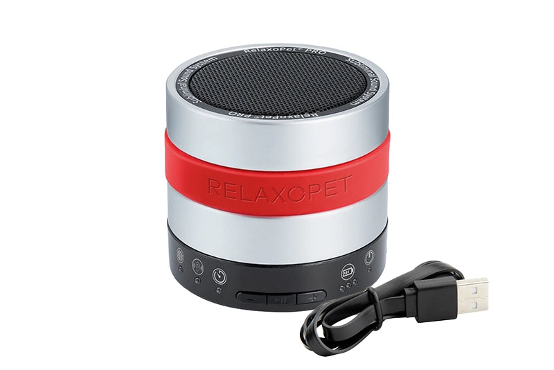 RelaxoPet anxiety relief Training device for dogs with compact silver and red design and USB charging cable